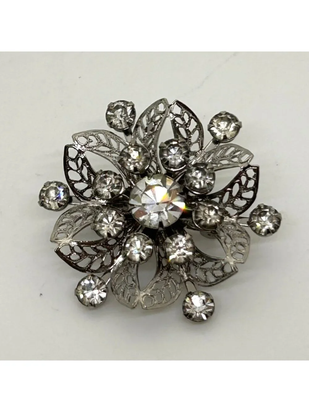 Vintage Silver Tone Rhinestone Brooch Pin Clear Crystal Floral Filigree Mid Cent